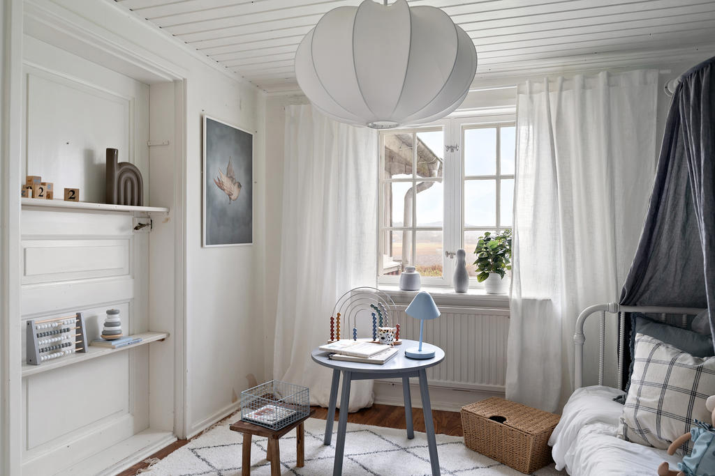 Sovrum innanför köket