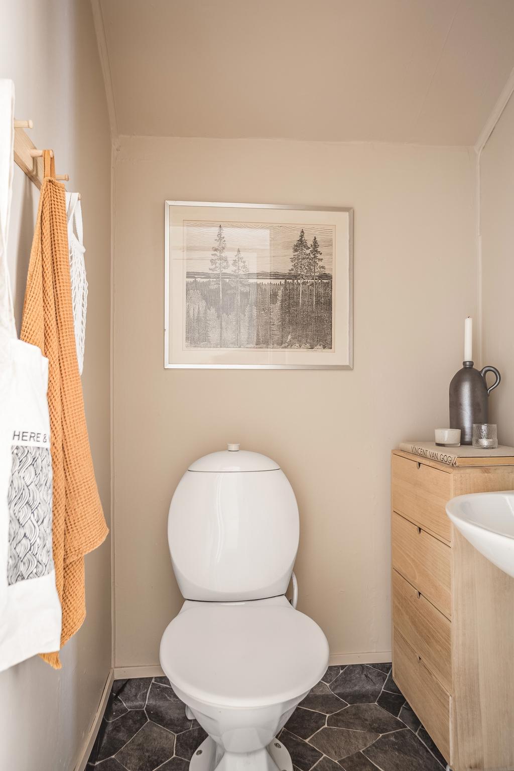 Toalett på övre plan