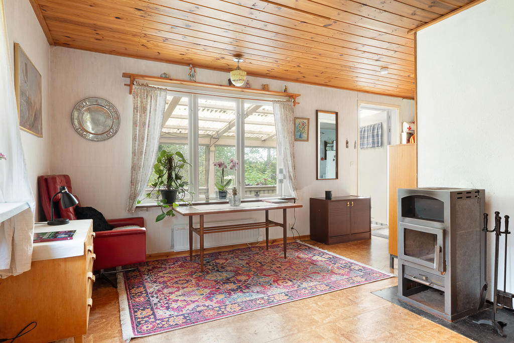 Storstuga med täljstenskamin