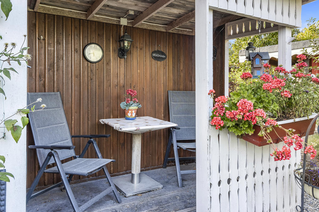 Veranda till uthus