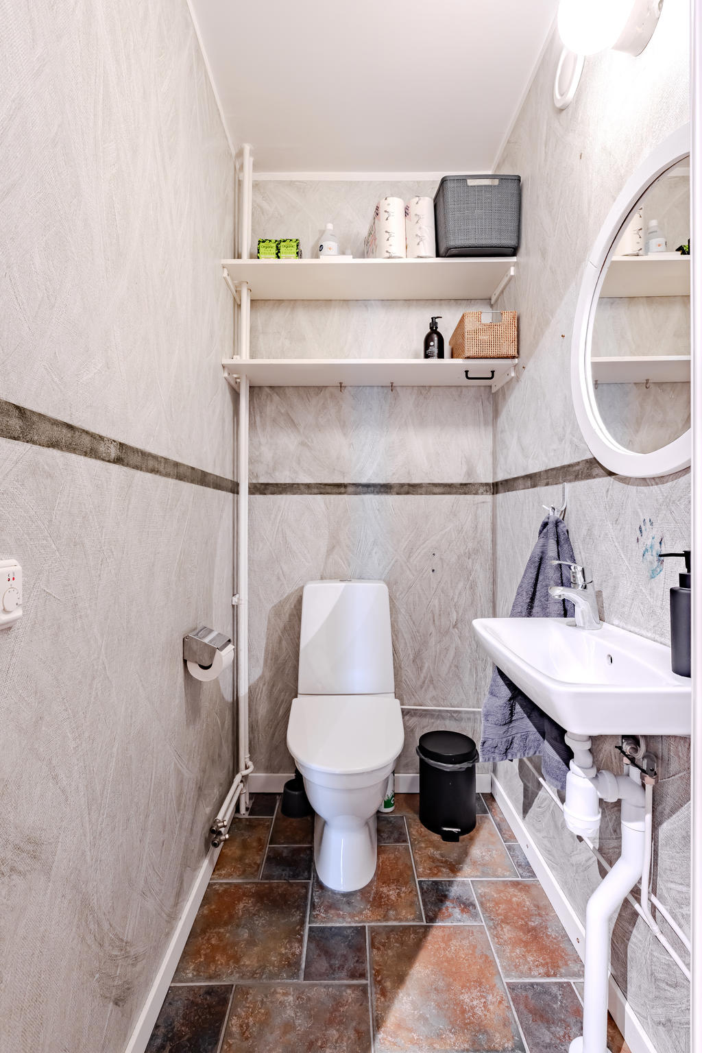 WC intill entrén med golvvärme