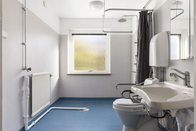 Badrum som är förberett för tvättmaskin