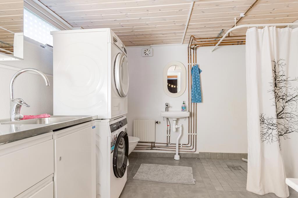 Tvättstuga med dusch och bastu