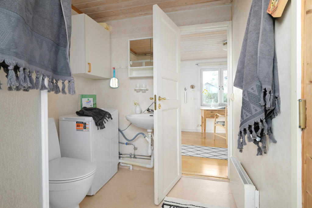 Duschplats med tvättmaskin