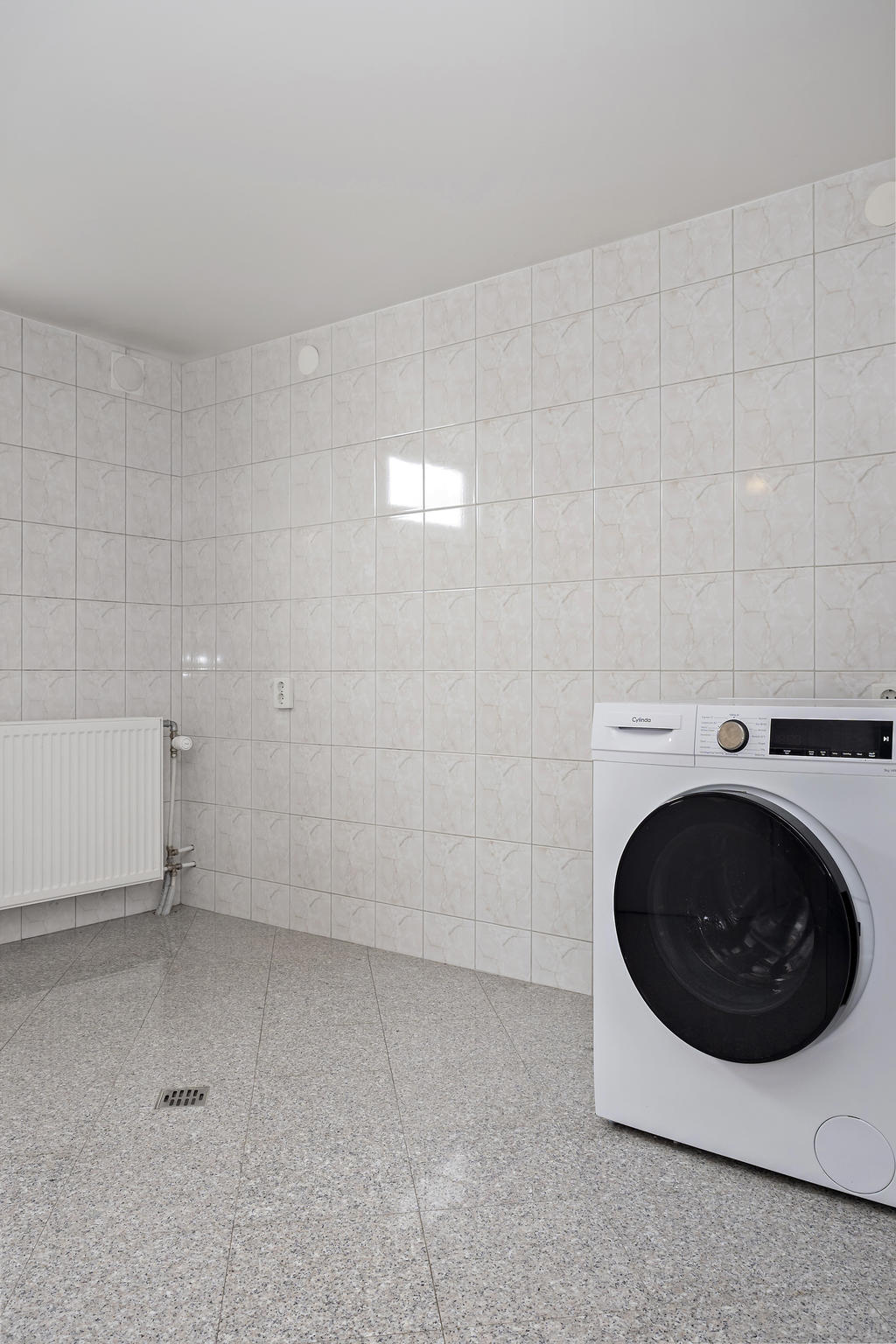 Tvättmaskin i badrum