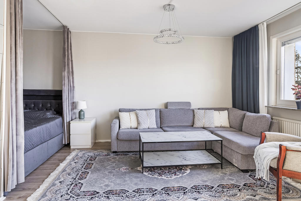 Kombinerat vardagsrum och sovplats