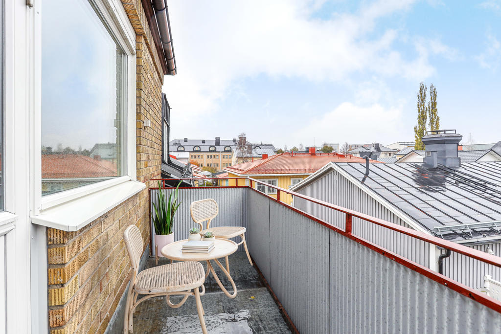 Balkong  - AI genererad möblering