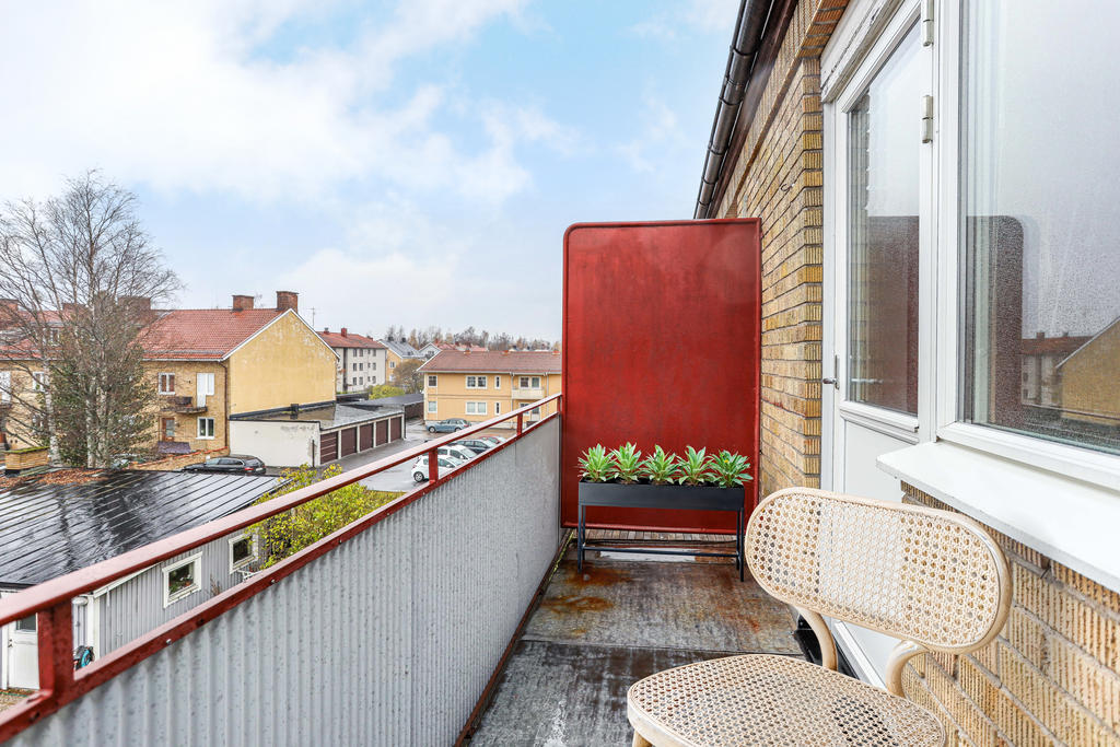 Balkong  - AI genererad möblering