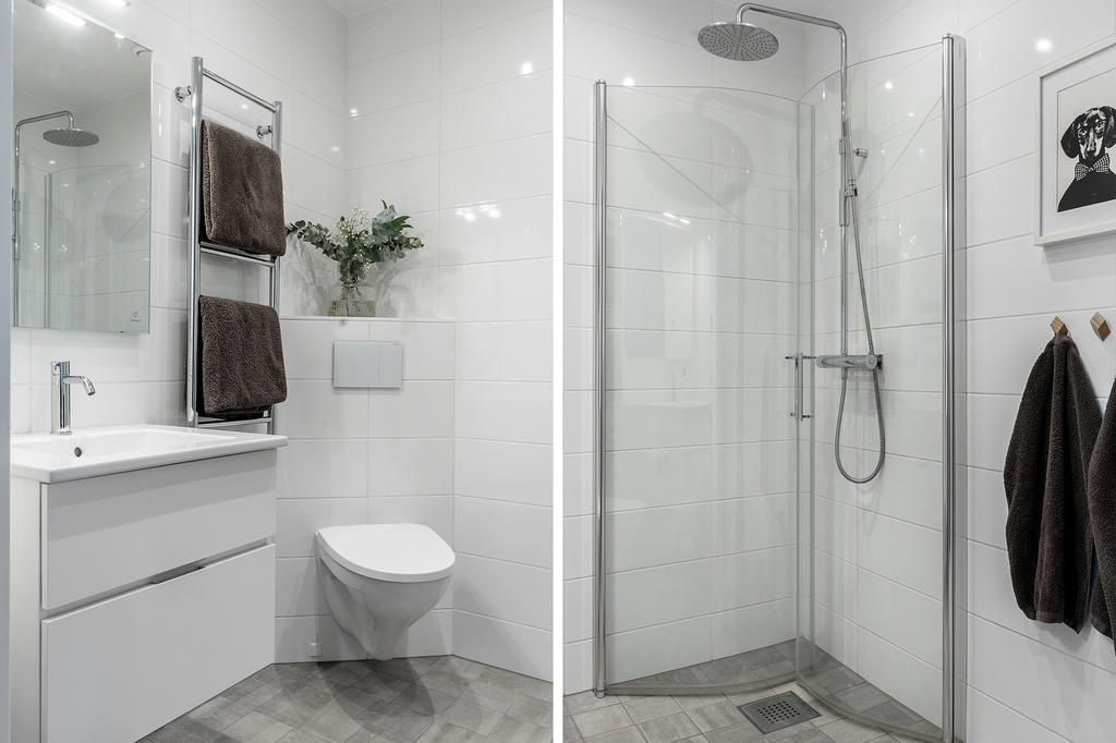 Fräscht helkaklat badrum på entréplanet i stilren design.