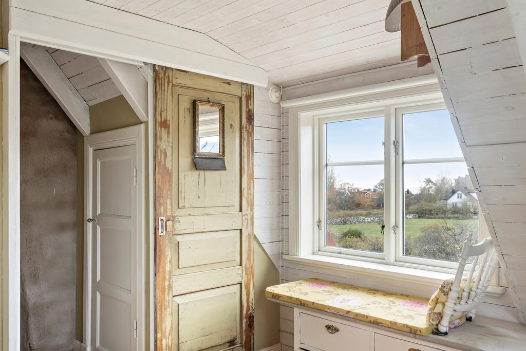 Skjutdörr med skiftande nyanser som berättar sin historia & charm.