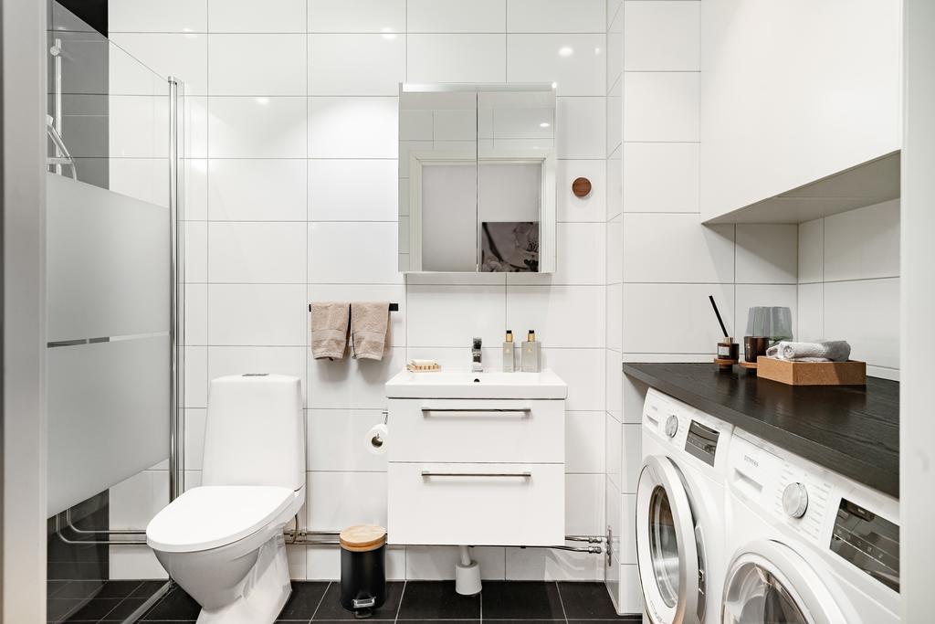 Duschrum med tvättavdelning 