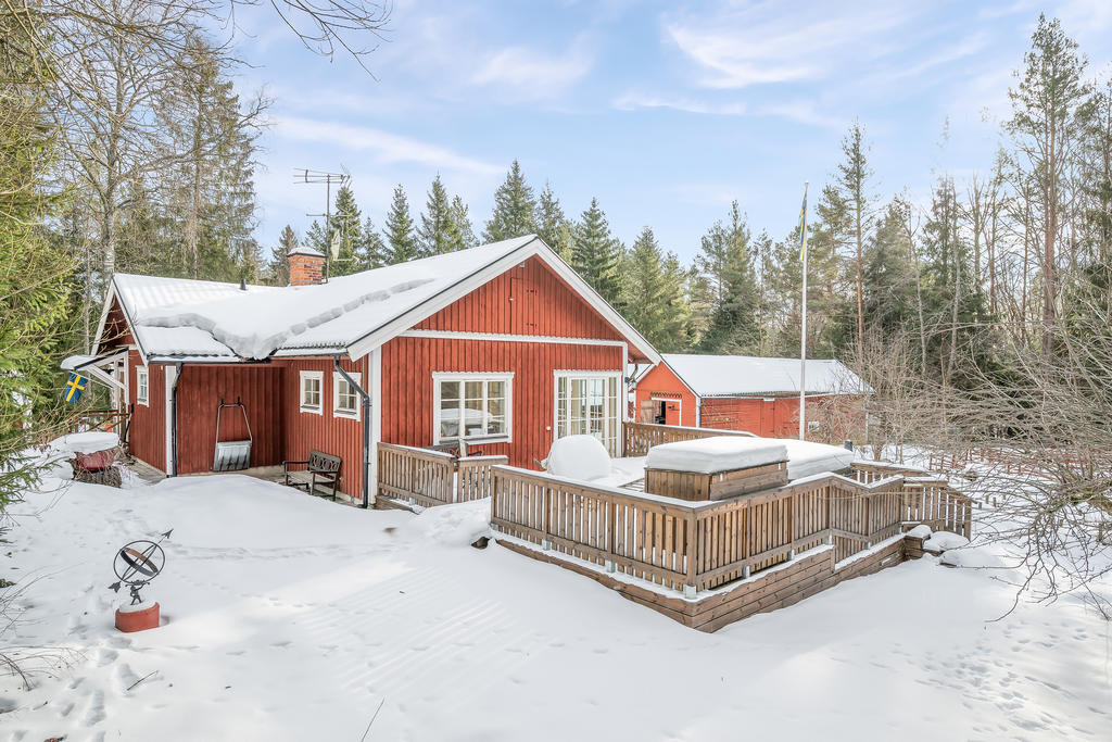 Huvudbyggnad med altan