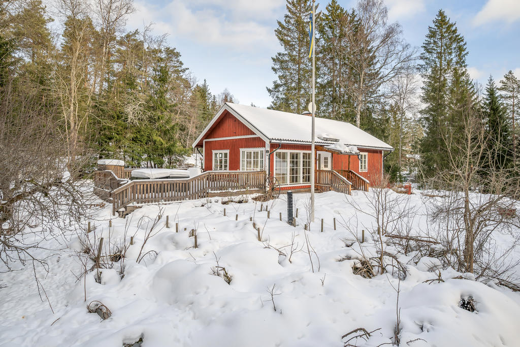 Huvudbyggnad med altan