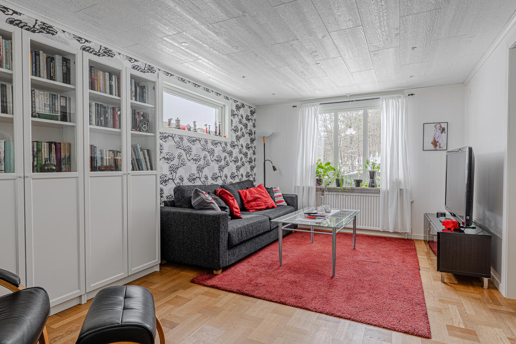 Vardagsrum som likväl kan göras om till ytterligare ett sovrum 