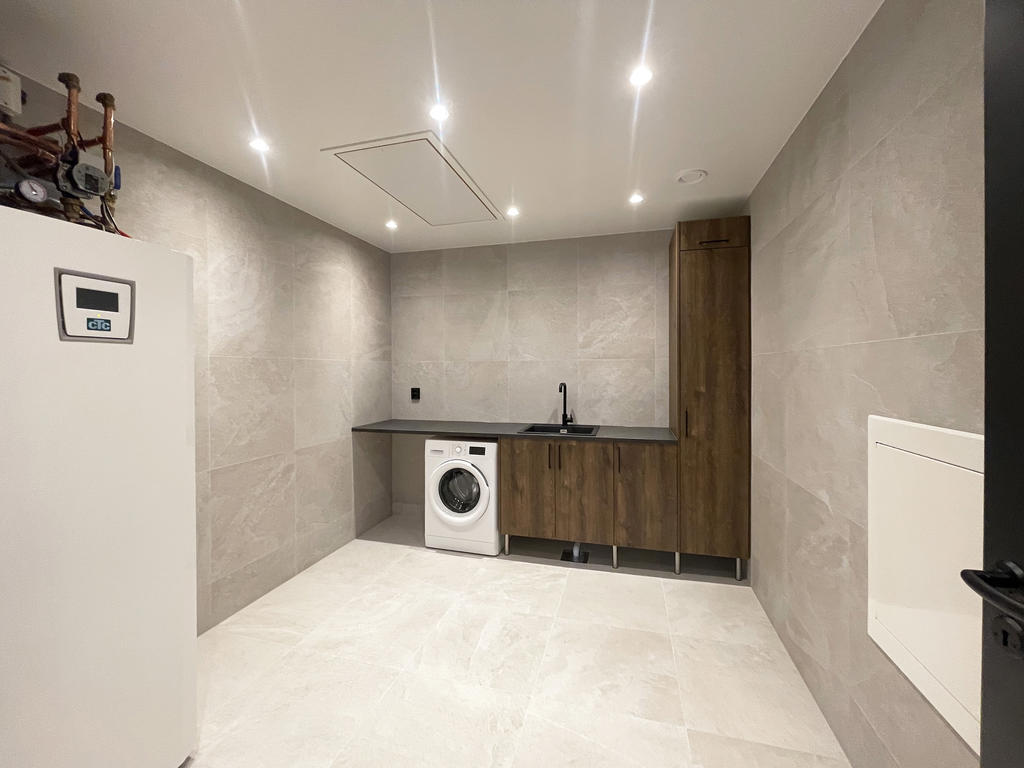 Tvättstuga/pannrum. Exempelbild från redan uppförda hus. 