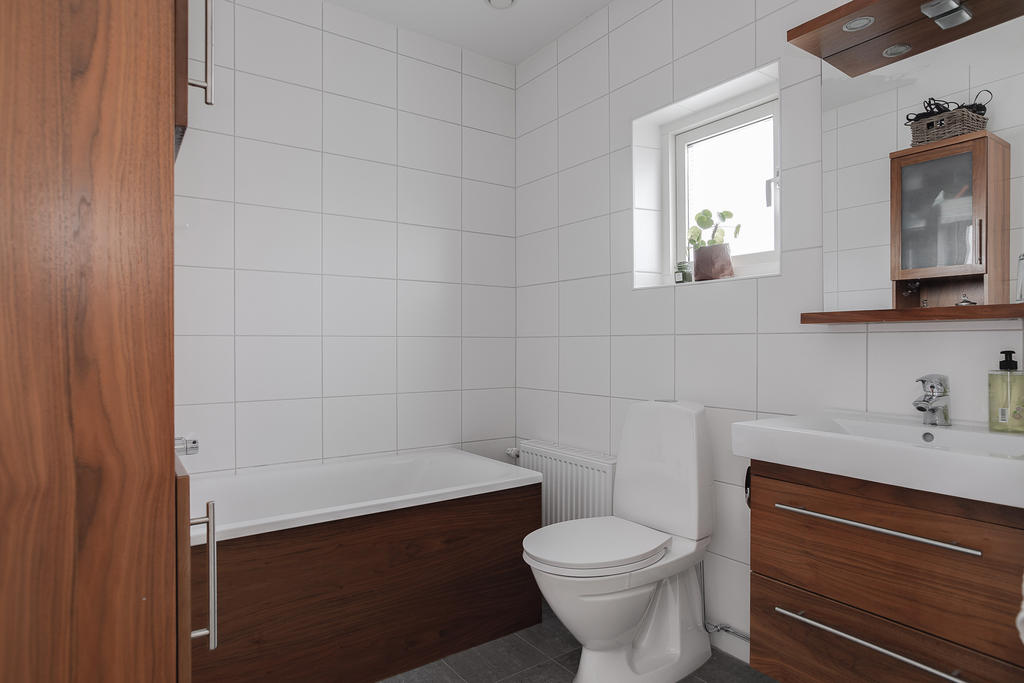 Badrum med badkar övre plan