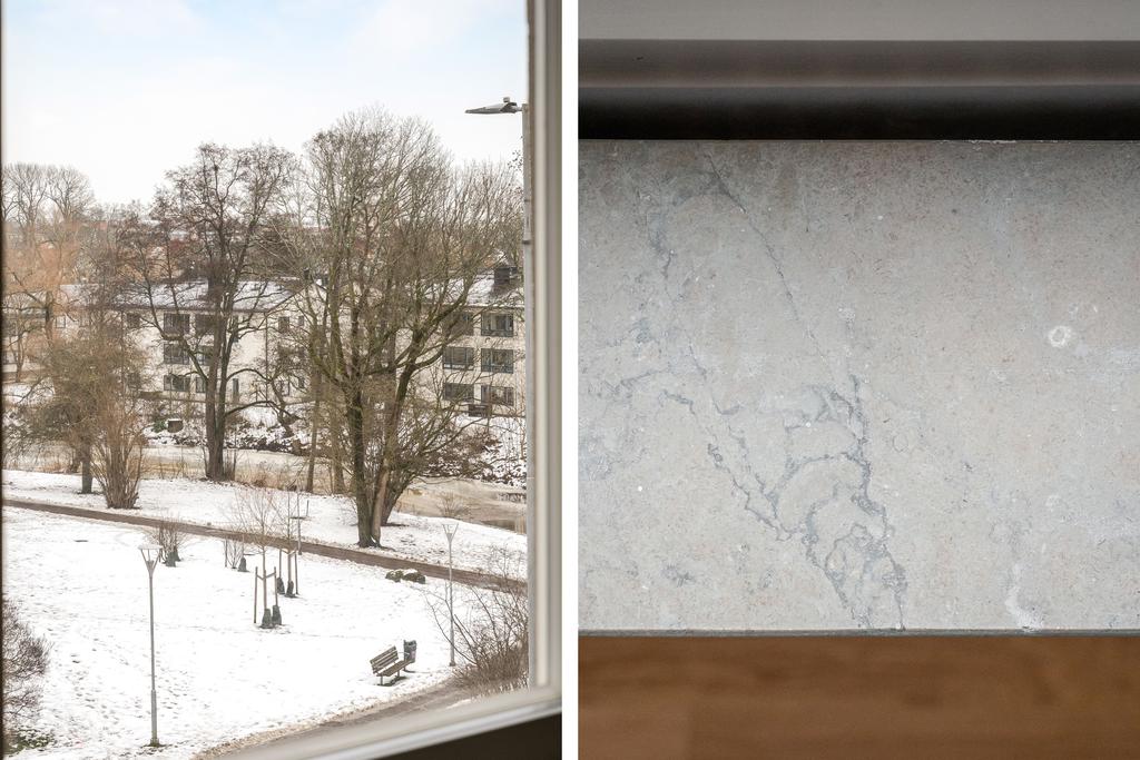 Utsikt mot ån/fönsterbrädor i sten