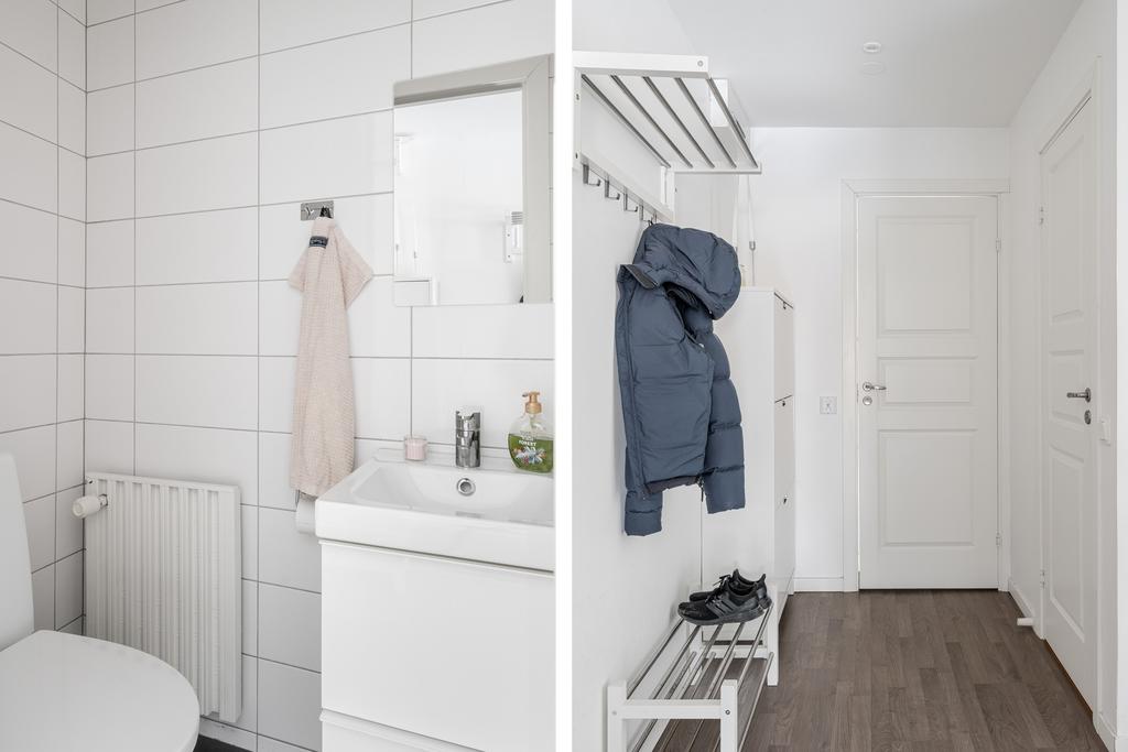 Liten gäst-WC samt hall med plats för avhängning