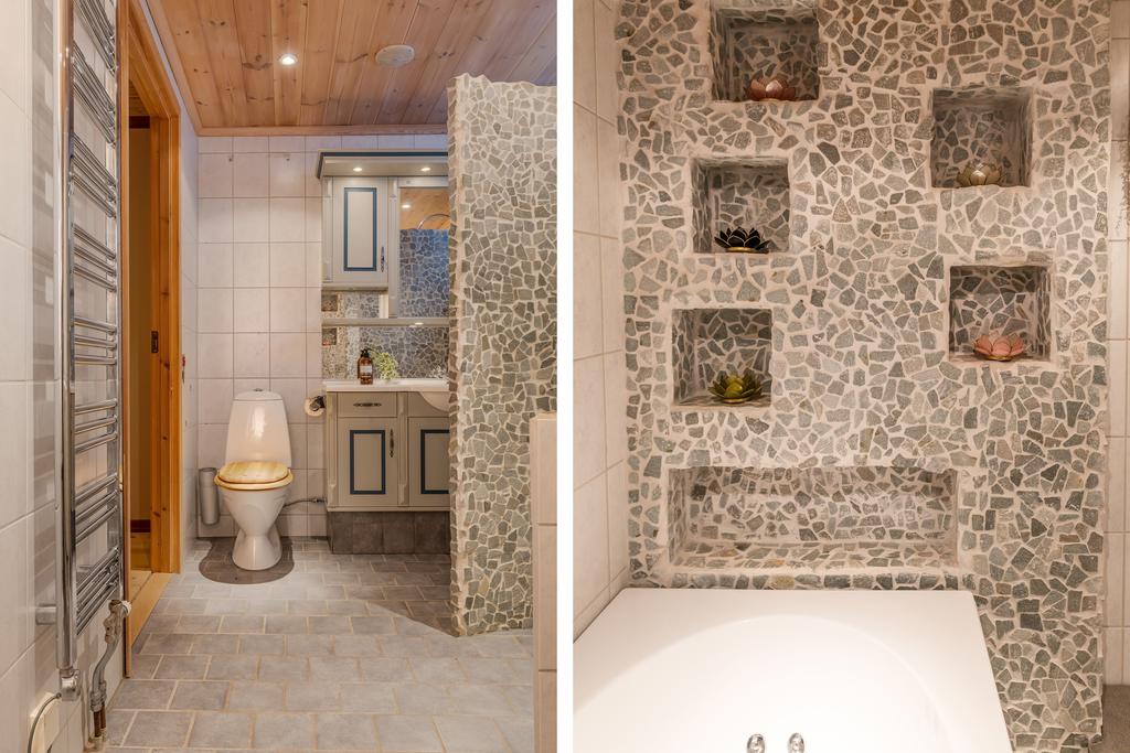 Relaxavdelning med wc, dusch, bubbelbad, och bastu, integrerat musiksystem i tak samt handdukstork.