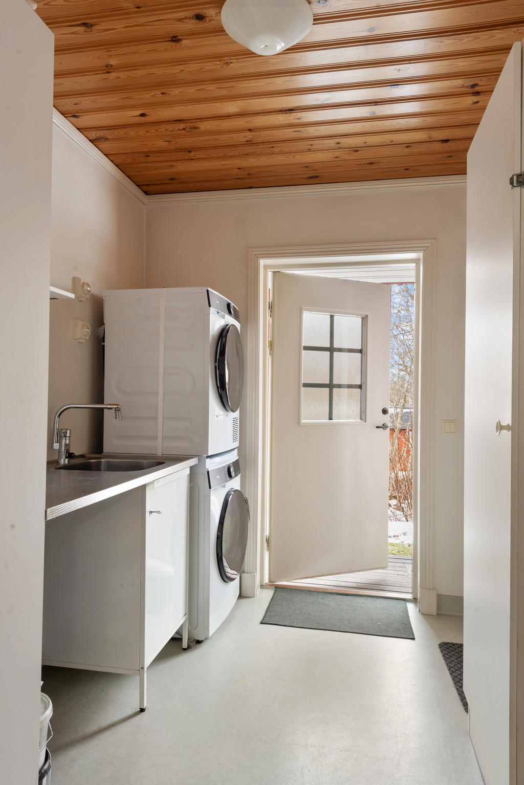 Klädvårdsrum med grovingång