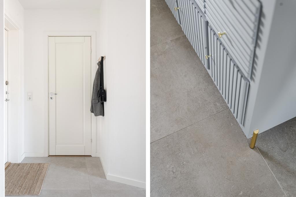 Hallgolv med stilrena klinkerplattor 