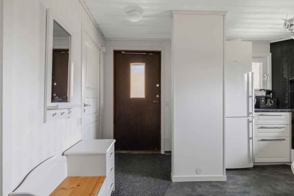 Hall med plats för klädavhängning.