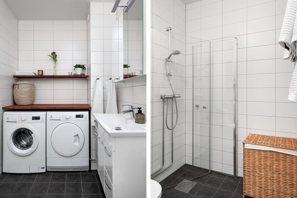 Helkaklat duschrum med tvättmaskin och torktumlare 