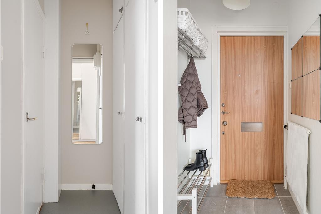 Hall och passage till duschrum med inbyggda garderober