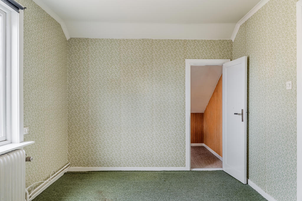 Sovrum med inredd kattvind