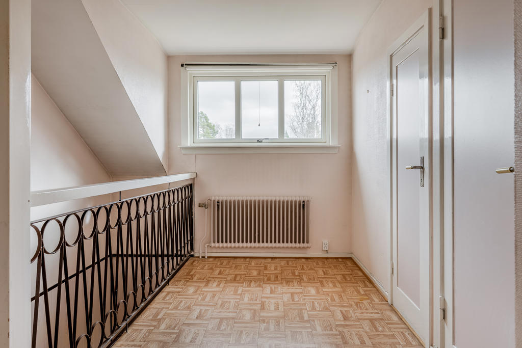 Övre plan med trevlig takkupa 