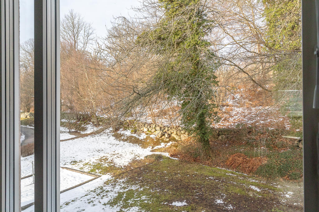 Njut av grönskan med utsikt mot Ekebacken