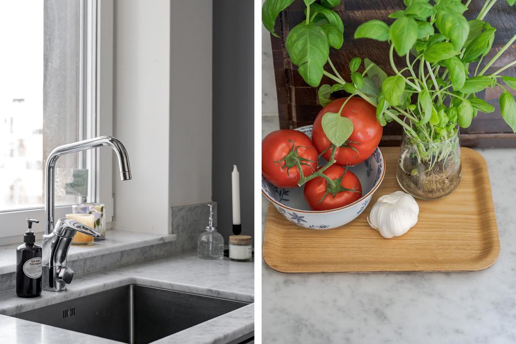 Lyxig känsla med bänkskiva i Carrara-marmor och infälld diskho