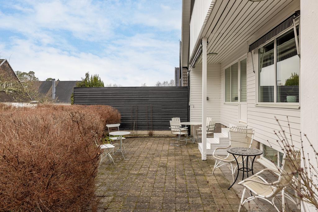 Uteplats med utgång från vardagsrum