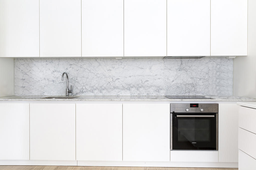 Smakfullt Kvänum-kök med marmor 