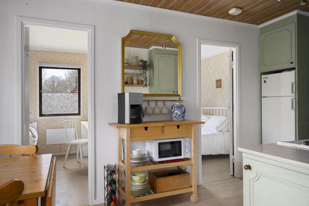 Ingång till två sovrum i samband med köket