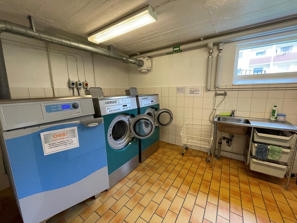 Gemensam tvättstuga i källaren