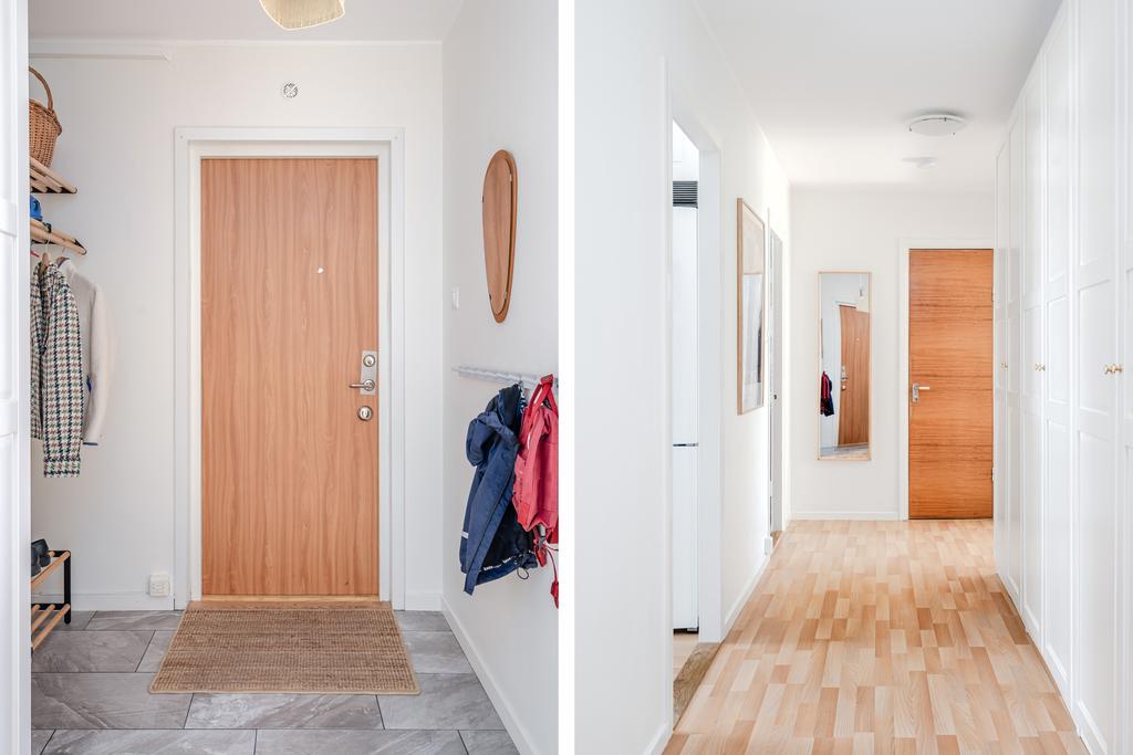 Hall med praktisk klinker innanför dörren