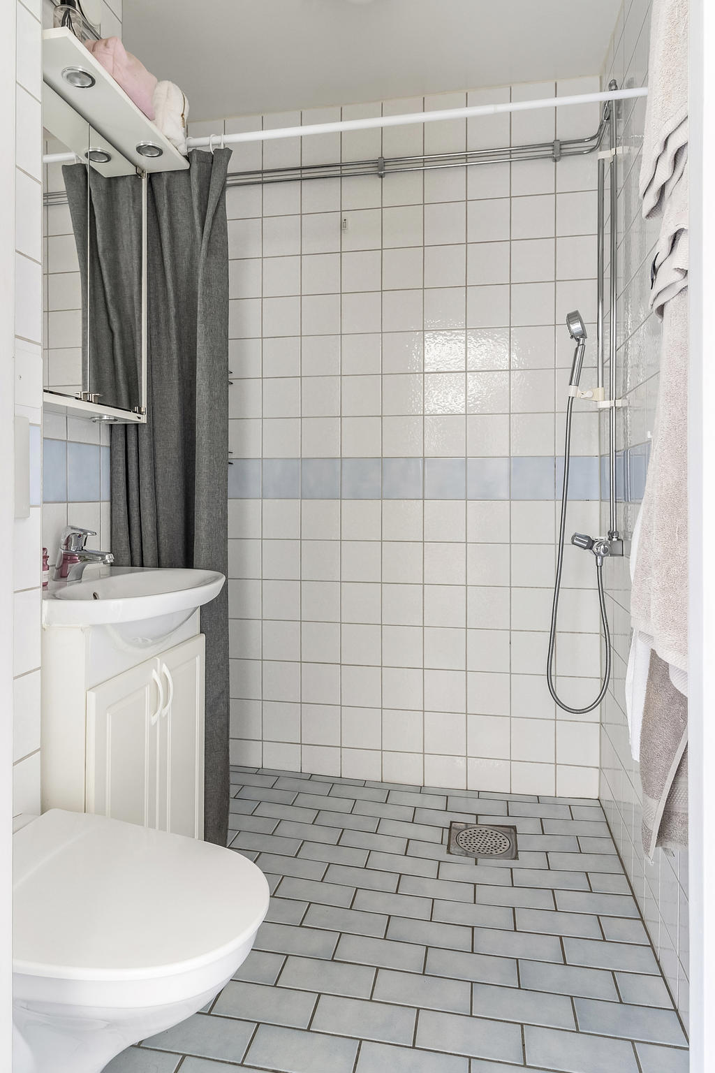 Badrum med kakel och klinker