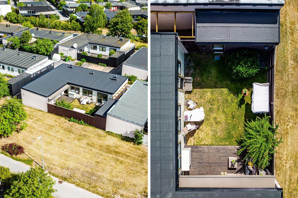 Äldre bild. På innergården har man fällt träd och satt in en pergola.