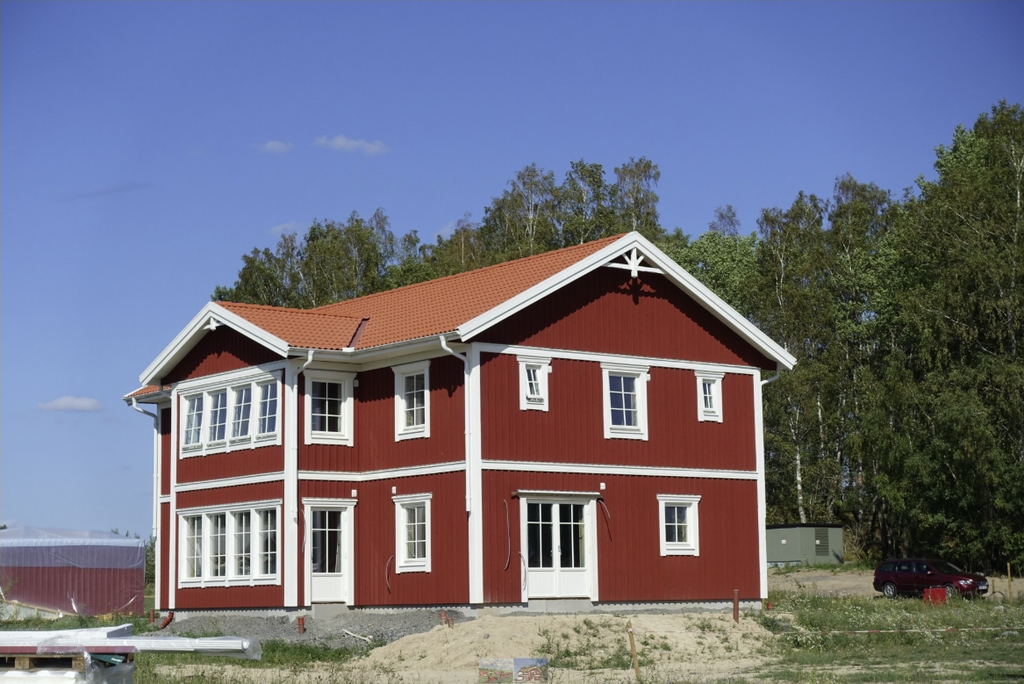 Huset på bilden står på annan tomt än den annonserade.