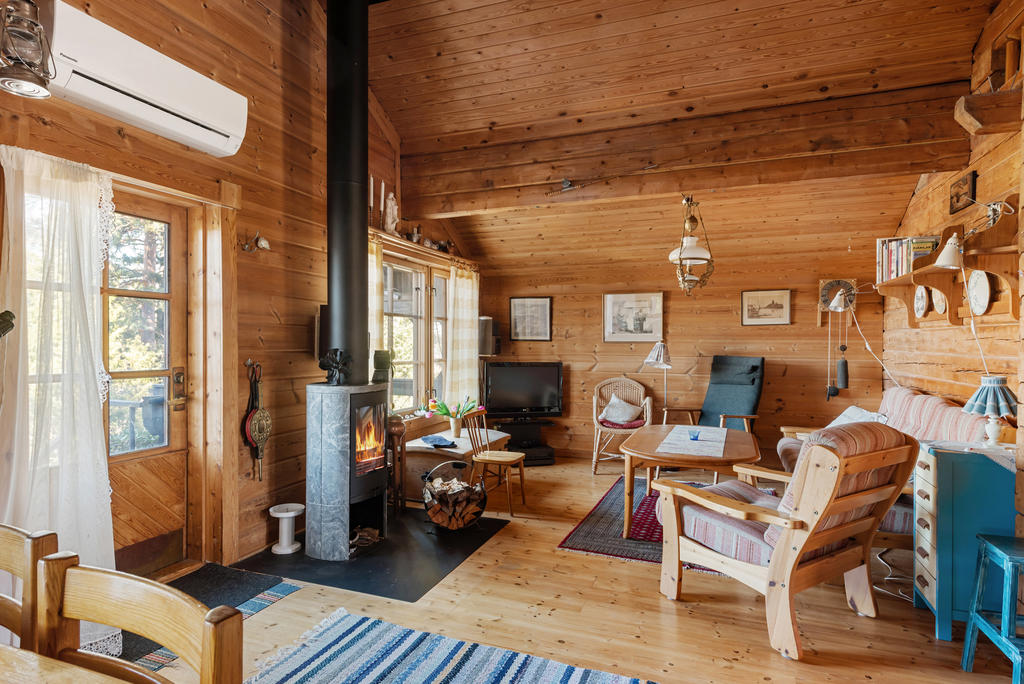 Allrum med täljstenskamin