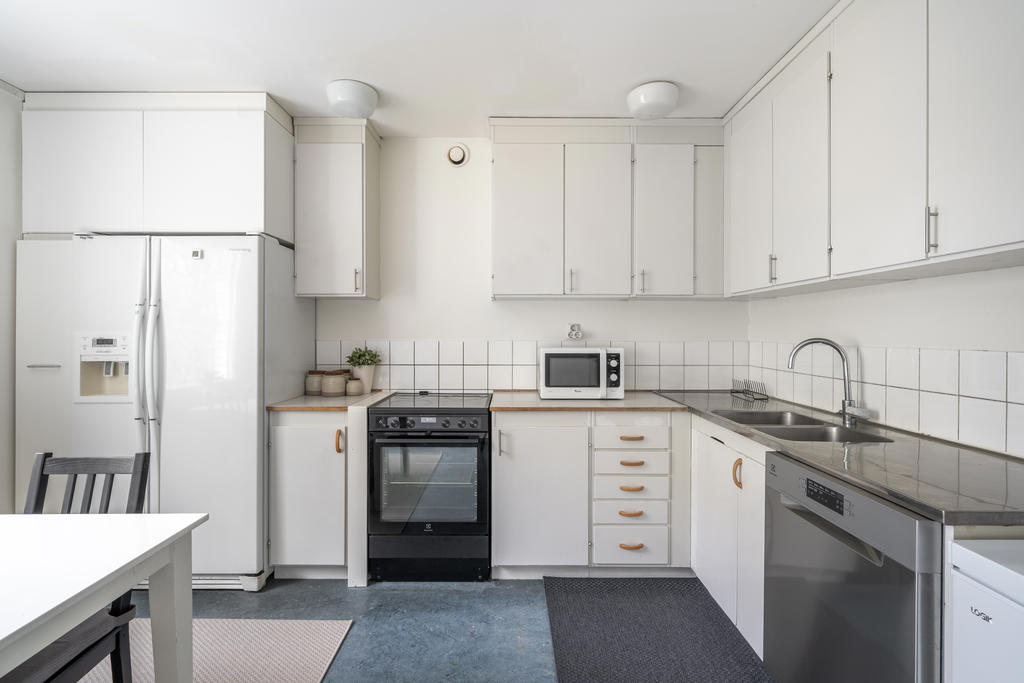 Köket blir en naturlig plats för familjen att samlas.