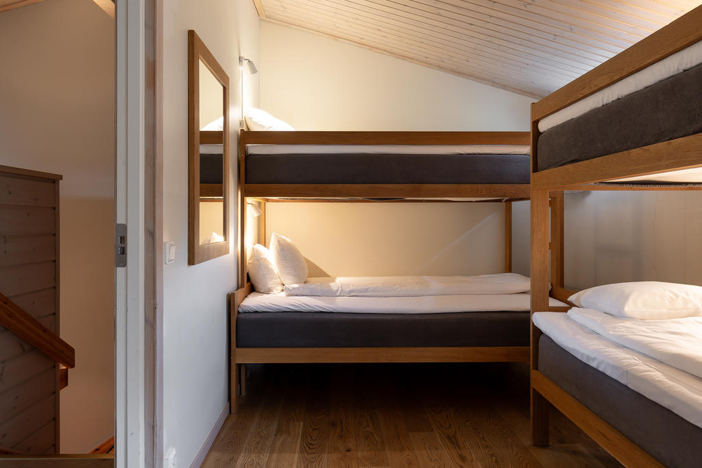 Sovrum med våningssängar på övervåningen