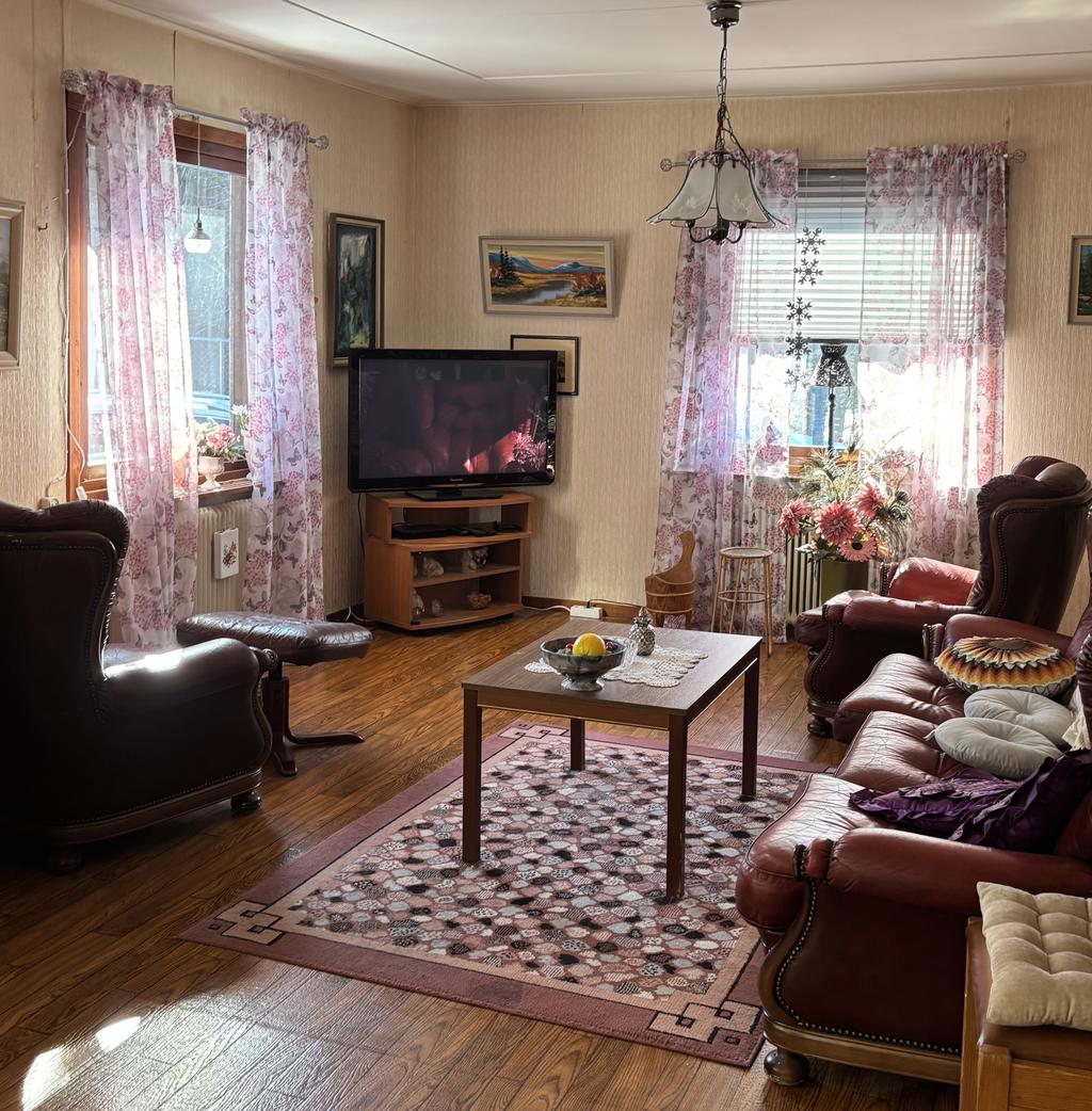 Vardagsrum med möjlighet att göra om till ett extra sovrum.