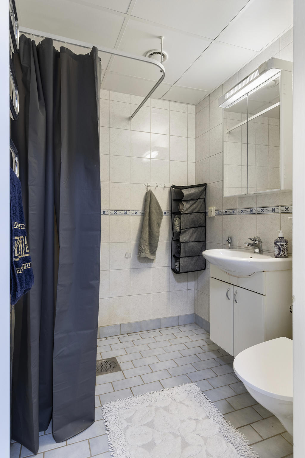 Badrum med kakel och klinker