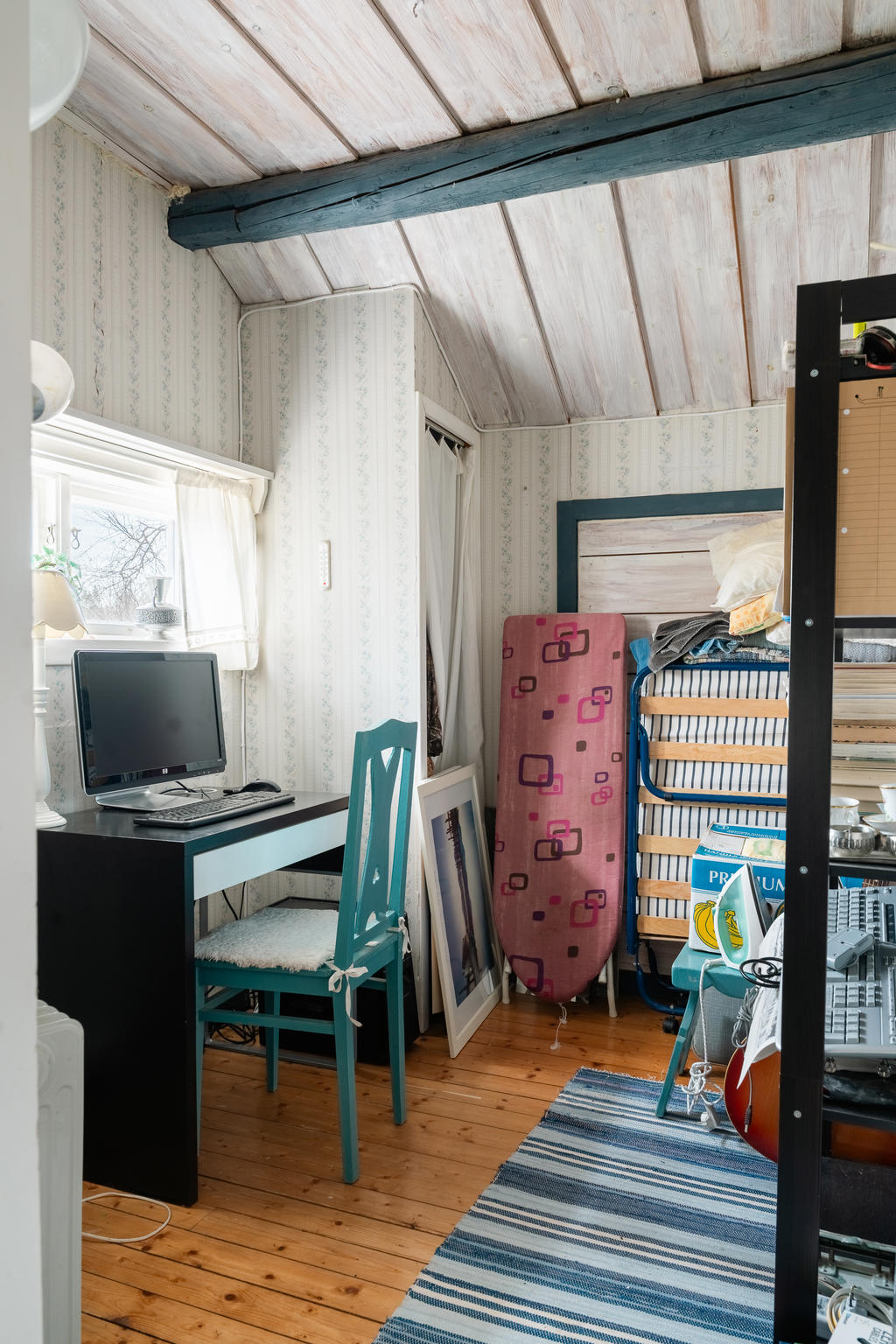 Sovrum på loftet i bostadshuset