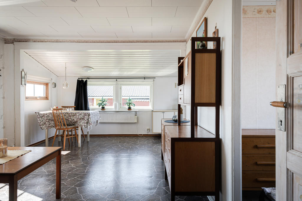 Vardagsrum och matplats i öppen planlösning