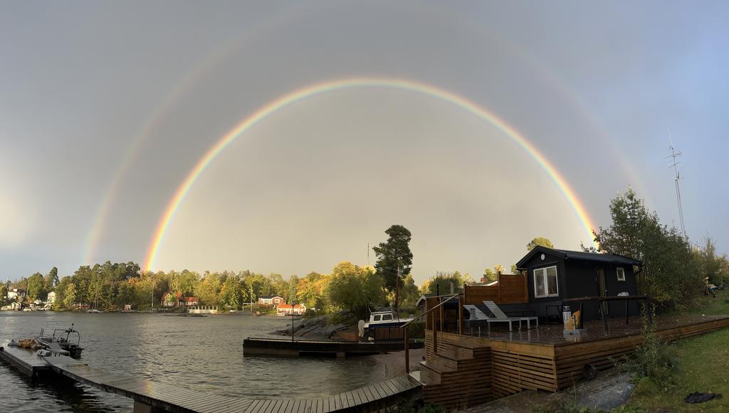 Himmel med dubbl regnbågar