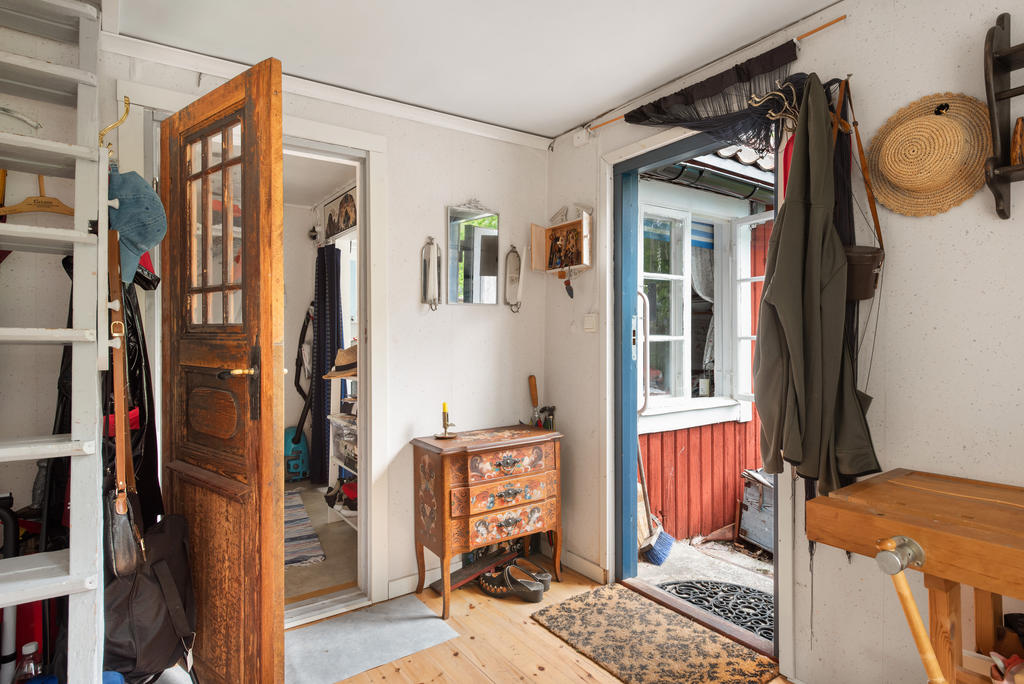 Hallen med trappa upp till loftet. 
