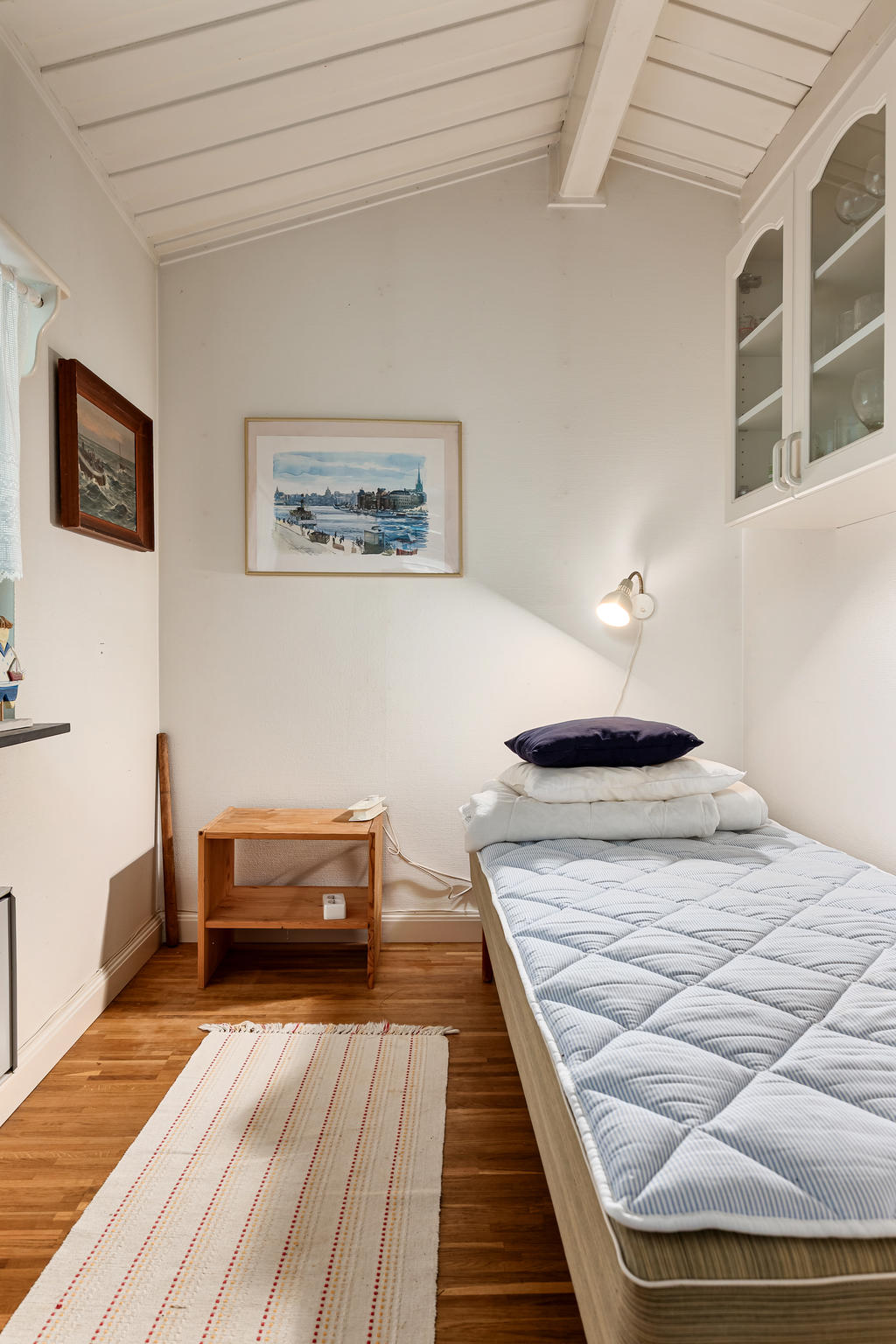 Det mindre sovrummet i bostadshuset